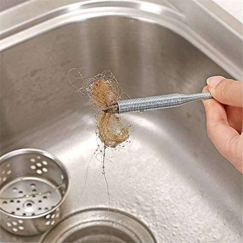 DRILAX drain cleaning tool flexible grabber retrieving hair clump from stainless steel sink drain