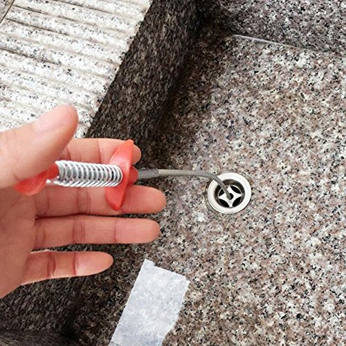DRILAX drain cleaning tool flexible grabber mechanical fingers reaching into stone sink drain