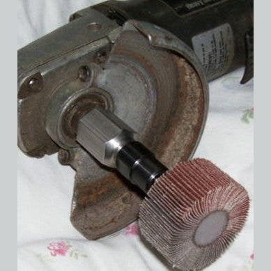 DRILAX flapper adapter attached to angle grinder with abrasive flap wheel for metal sanding and polishing