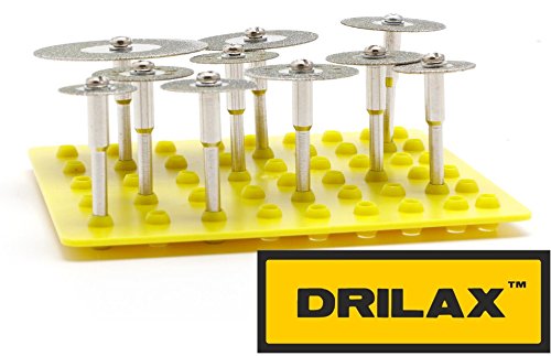 Diamond cut-off discs mounted on 1/8 inch mandrels standing in the holder tray