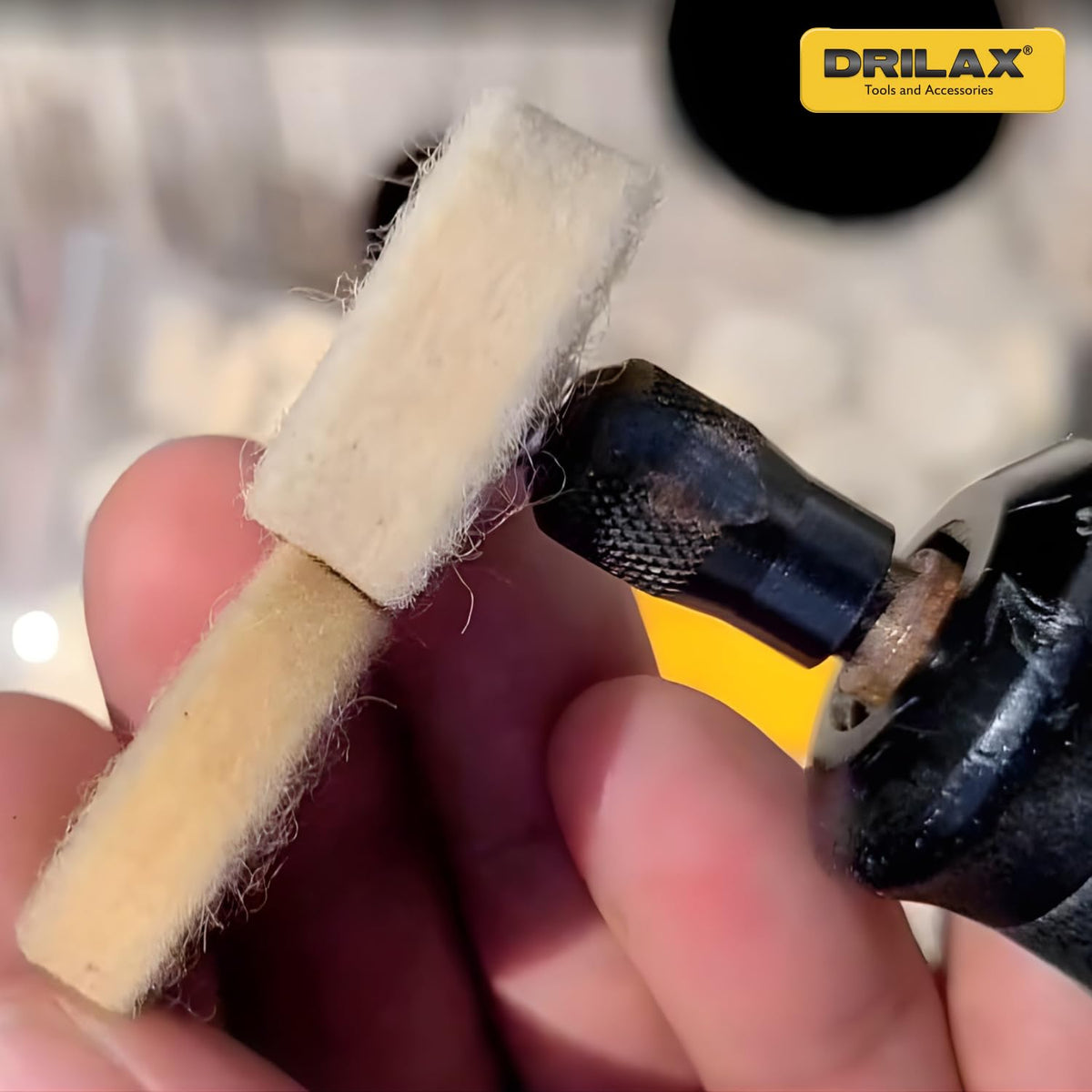 Wool buffing wheel mounted in a rotary tool