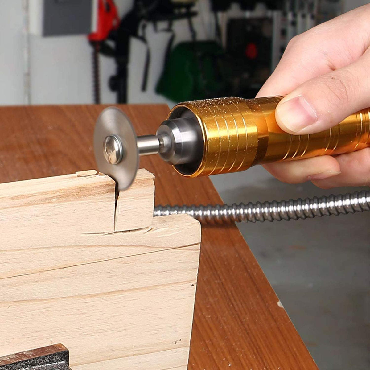 HSS saw blade cutting a slot in wood with a rotary tool