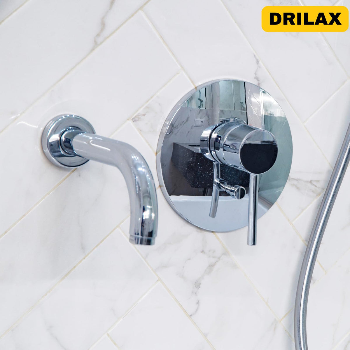 Shower valve trim installed in tile