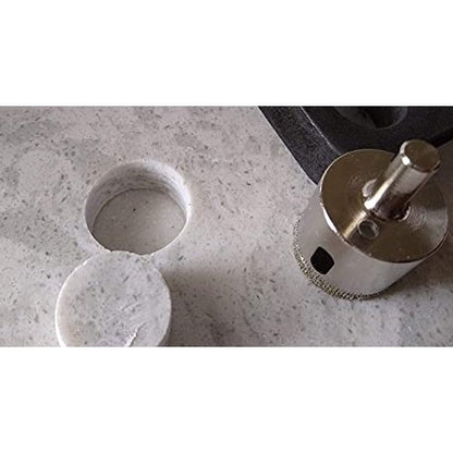 1 inch diamond drill bit drilling a hole in ceramic tile