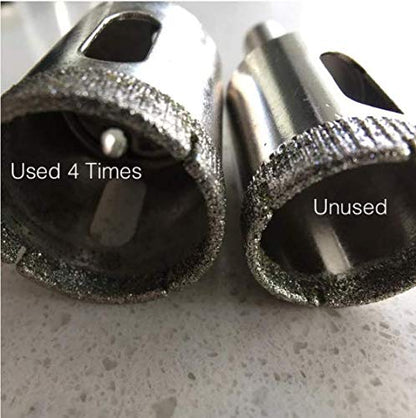 Diamond hole saw used 4 times next to an unused one