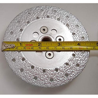 4-1/2 inch diamond grinding wheel measured with a tape measure