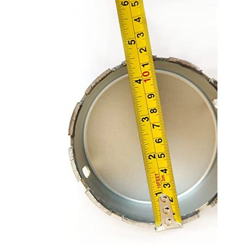 Inside of the 4-1/2 inch hole saw measured with a tape measure