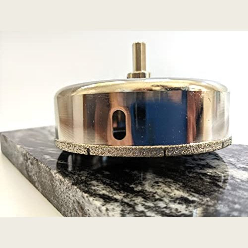DRILAX 4.5 inch tile hole saw for ceramic with durable diamond coating on a marble surface
